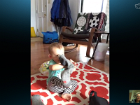 Screen Shot 2015-10-17 at 9.32.23 PM  Val putting on her mom&#39;s sock while ga-ga grandparents look on